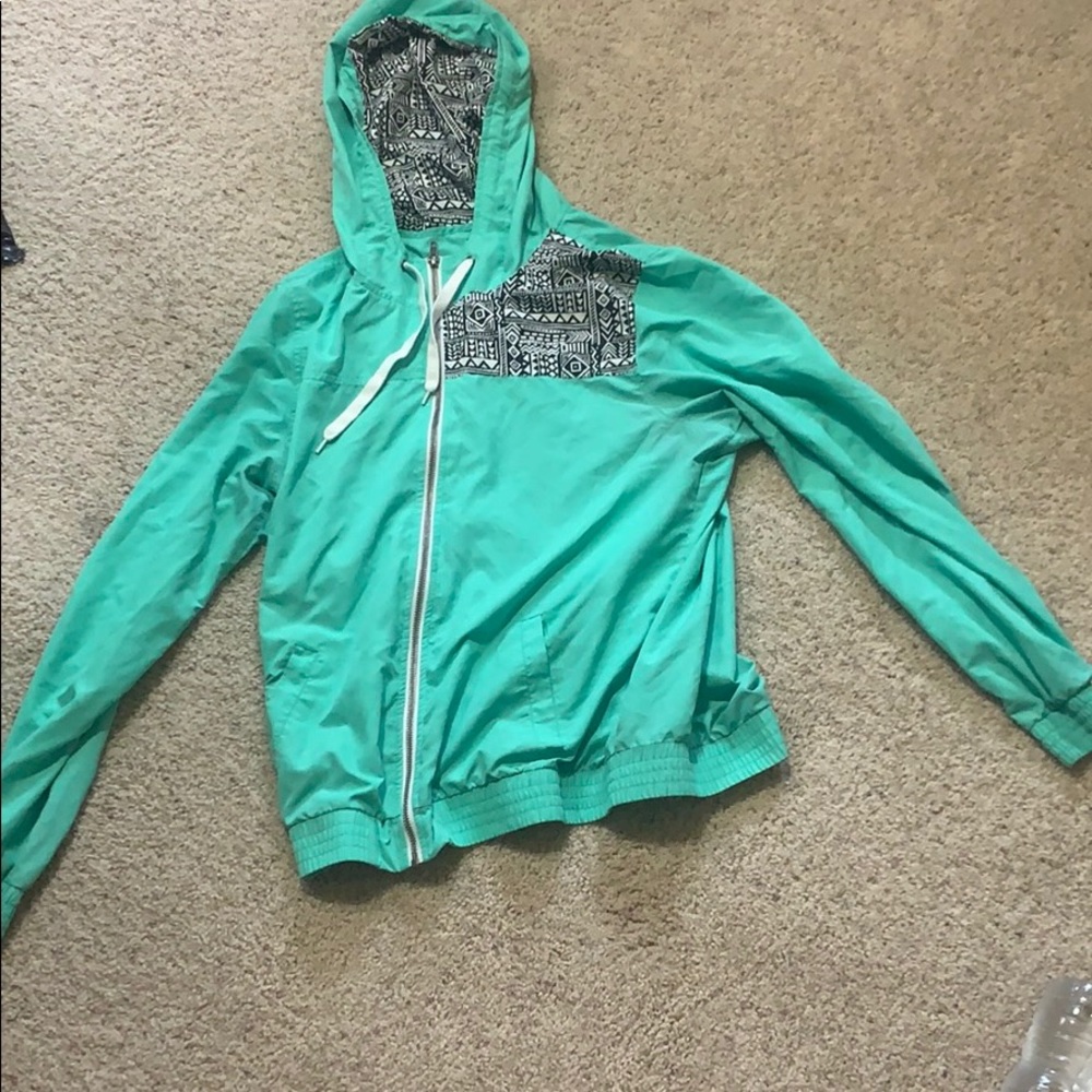 Turquoise windbreaker